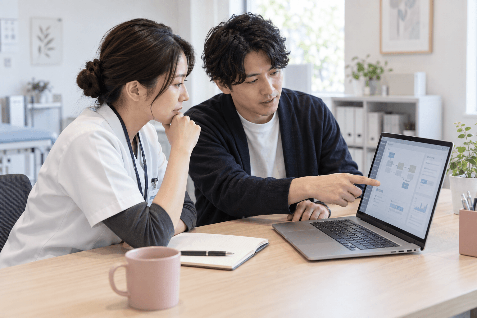 Illustration of a healthcare professional and an engineer reviewing a workflow together